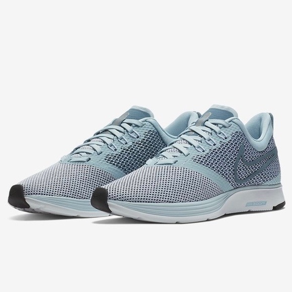 nike running air zoom strike trainers in grey